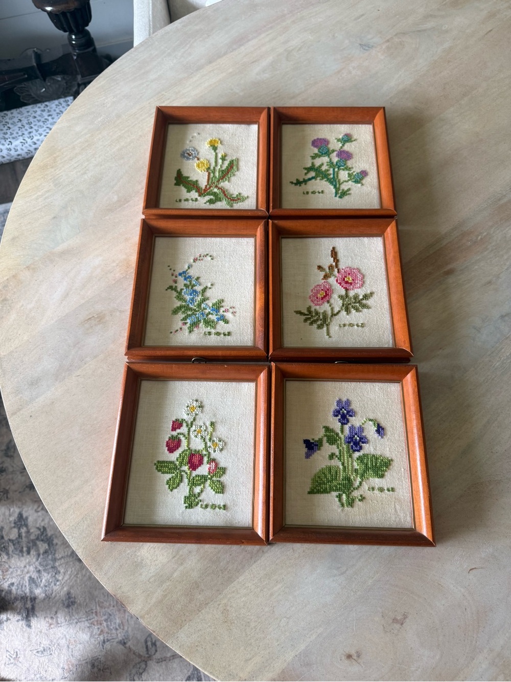 Set of Six Vintage Floral Cross-Stitch Prints in Warm Brown Wood Frames